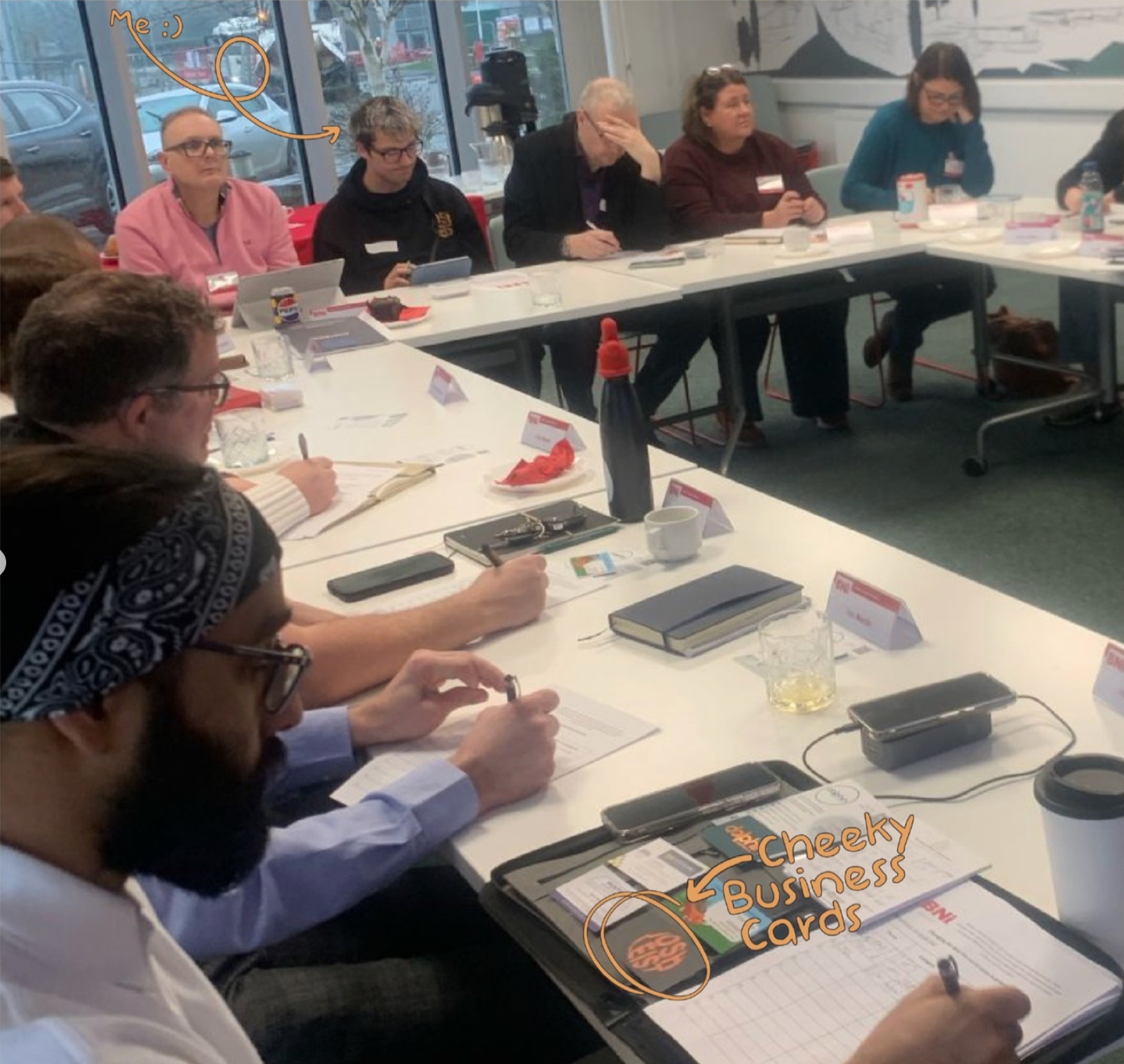 Josh Leist at a business workshop with his printed business cards in use